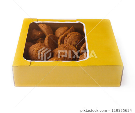 Cardboard box full of chocolate chip cookies isolated on white background Cardboard box full of chocolate chip cookies isolated on white background 119555634
