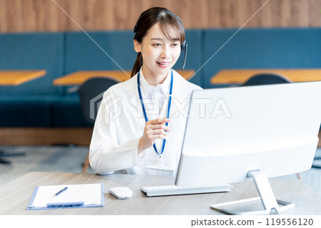 A medical professional operator wearing a white coat 119556120