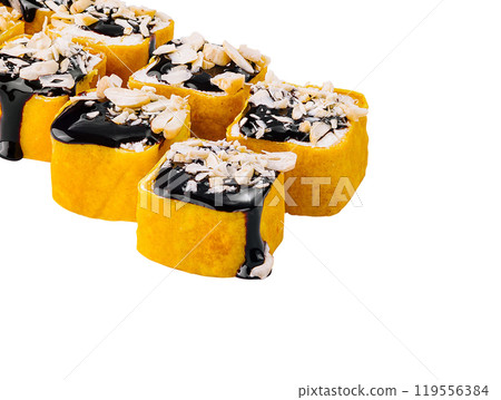 Sweet sushi rolls with nuts and chocolate syrup on white background Sweet sushi rolls with nuts and chocolate syrup on white background 119556384