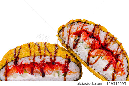 Two sushi rolls covered in panko breading with soy sauce drizzled on top Two sushi rolls covered in panko breading with soy sauce drizzled on top 119556695