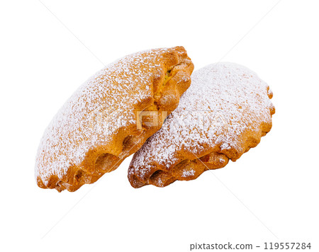 Two freshly baked cookies covered with sugar powder on white background 119557284