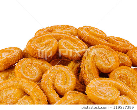 Pile of palmier cookies covered in granulated sugar isolated on white background 119557399