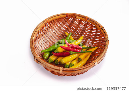 Harvested chili peppers in a colander Harvested chili peppers in a colander 119557477