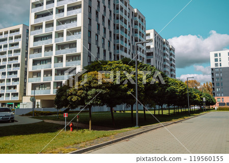 Cityscape of a residential area with modern apartment buildings, new green urban landscape in the city Cityscape of a residential area with modern apartment buildings, new green urban landscape in the city 119560155