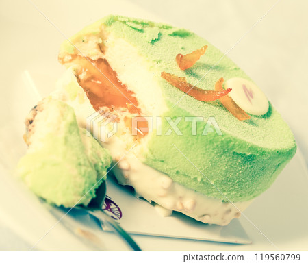 Tasty pistachio cake with caramel cream Tasty pistachio cake with caramel cream 119560799