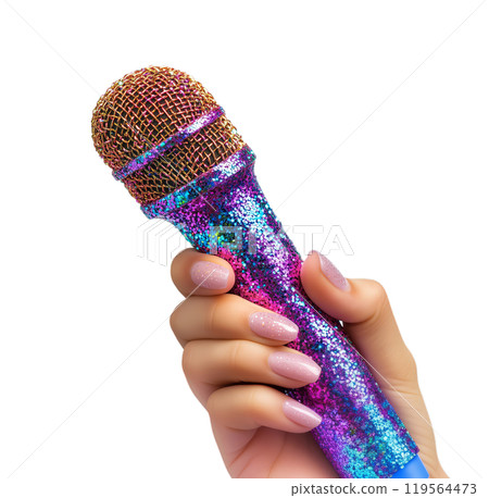 A hand with pink nails delicately grasps an iridescent, glittery microphone in shades of blue and purple. A hand with pink nails delicately grasps an iridescent, glittery microphone in shades of blue and purple. 119564473