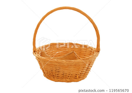 Straw basket for storage. Wicker basket isolated on white background. Craft household. Cozy lifestyle. Straw basket for storage. Wicker basket isolated on white background. Craft household. Cozy lifestyle. 119565670