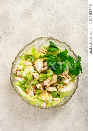 Waldorf salad, celery salad with apple, in a glass salad bowl, natural light, homemade, no people, 119565749