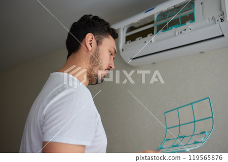Dirty air conditioner filter need cleaning. Air conditioner service, repair and clean equipment. 119565876