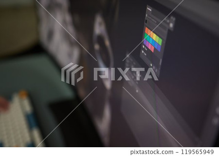Designer Editing Photo On Computer In Office 119565949