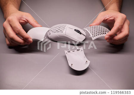 white new wireless computer mouse flat lay with led lights 119566383