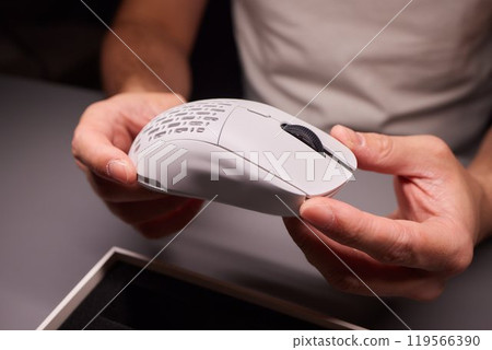 white new wireless computer mouse flat lay with led lights 119566390