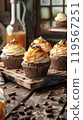 Rustic Wooden Tray with Coffee-Infused Cupcakes and Caramel Buttercream in a Cozy Cafe 119567251
