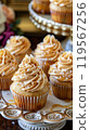Salted Caramel Cupcakes with Buttercream, Sea Salt Flakes, and Caramel Drizzle on a Vintage Platter 119567256