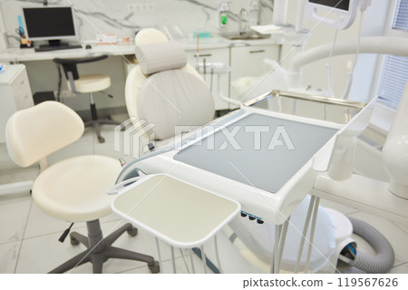Experience stateoftheart tools at a modern dental clinic with advanced equipment 119567626