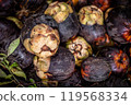 Ice apple or toddy palm fruit background, the perfect tropical treat. Top view black fruit background 119568334
