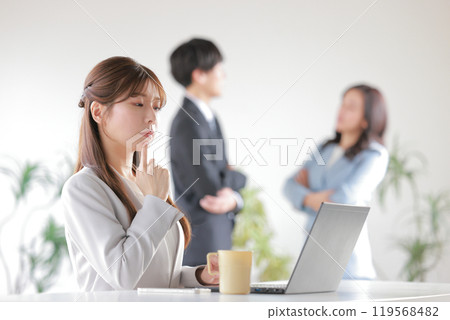 A business person gossiping and a woman who is curious about the conversation_1 A business person gossiping and a woman who is curious about the conversation_1 119568482