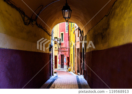 Colorful streets of the historic center of the city of Menton on the French Riviera, Cote d'Azur, France 119568913