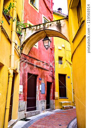 Colorful streets of the historic center of the city of Menton on the French Riviera, Cote d'Azur, France Colorful streets of the historic center of the city of Menton on the French Riviera, Cote d'Azur, France 119568914