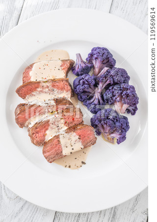 Beef steak with cauliflower 119569614