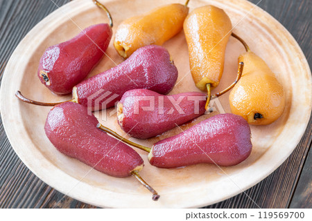Red and white poached pears Red and white poached pears 119569700