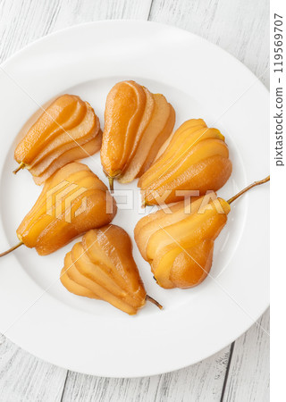 White wine poached pears White wine poached pears 119569707