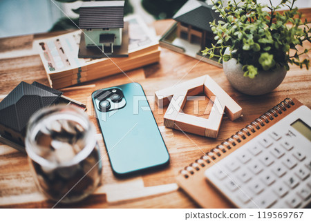 House model and smartphone Real estate business image House model and smartphone Real estate business image 119569767