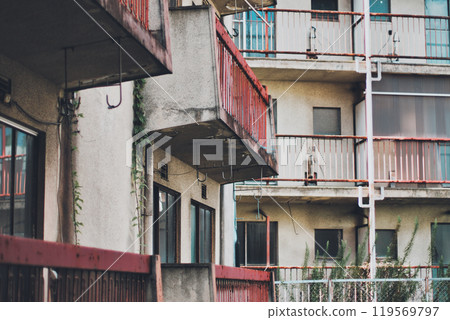Dilapidated housing complex building 119569797