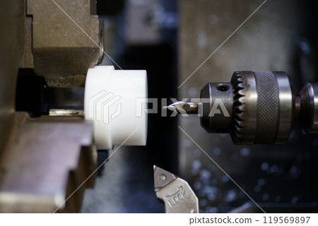 Scene of center machining on a lathe 119569897