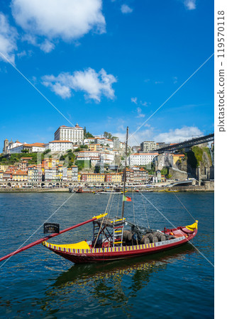Porto City and Traditional Boat with Port Wine Barrels on Douro River Porto City and Traditional Boat with Port Wine Barrels on Douro River 119570118
