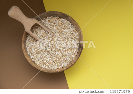 Fine ground barley copy space Whole spelt grain species. High protein fiber-rich vegan plant based food ingredient. Gluten free superfood healthy nutritional dietary alternative 119571979
