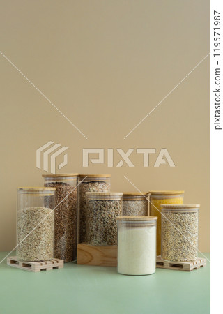 Set of Raw porridges in sustainable packaging. Refillable systems of packaging. Gluten free cereals. Health gut benefits. Concept of alternative whole spelt grain ingredient. Vegetarian diet recipes Set of Raw porridges in sustainable packaging. Refillable systems of packaging. Gluten free cereals. Health gut benefits. Concept of alternative whole spelt grain ingredient. Vegetarian diet recipes 119571987