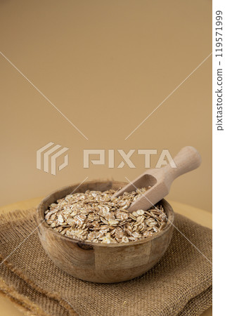 Raw oatmeal porridge Gluten free cereals. Health gut benefits. Concept of alternative whole spelt grain ingredient. Vegetarian diet recipes. Plant-based lifestyle. Copy space Protein rich 119571999