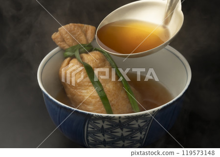 Kitsune Udon - Kinchaku Kitsune Udon - Udon stuffed in deep-fried tofu and broth poured over it Kitsune Udon - Kinchaku Kitsune Udon - Udon stuffed in deep-fried tofu and broth poured over it 119573148