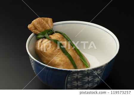Kitsune udon - Kinchaku kitsune udon - Udon noodles stuffed in deep-fried tofu Kitsune udon - Kinchaku kitsune udon - Udon noodles stuffed in deep-fried tofu 119573257