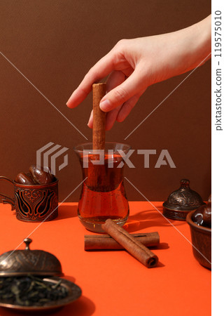 Hot Turkish tea in a transparent glass 119575010