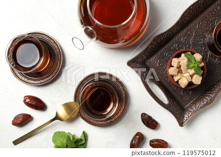Hot Turkish tea on a light background 119575012