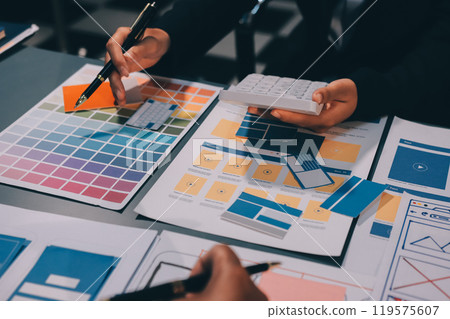 The designer team is designing the uxui system to make the uxui system work well on new phones and support system updates. Website development concept UI UX front end designer The designer team is designing the uxui system to make the uxui system work well on new phones and support system updates. Website development concept UI UX front end designer 119575607