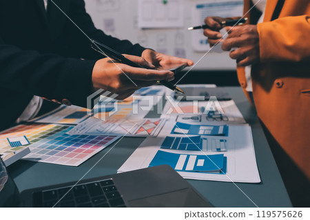 The designer team is designing the uxui system to make the uxui system work well on new phones and support system updates. Website development concept UI UX front end designer 119575626