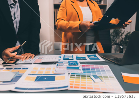 The designer team is designing the uxui system to make the uxui system work well on new phones and support system updates. Website development concept UI UX front end designer 119575633