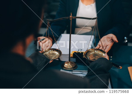 Judge gavel with Justice lawyers having team meeting at law firm background. Concepts of Law and Legal services. Judge gavel with Justice lawyers having team meeting at law firm background. Concepts of Law and Legal services. 119575668