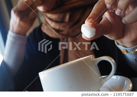 Experience the delightful joy of savoring sugar mixed with coffee as a cultural experience Experience the delightful joy of savoring sugar mixed with coffee as a cultural experience 119575887