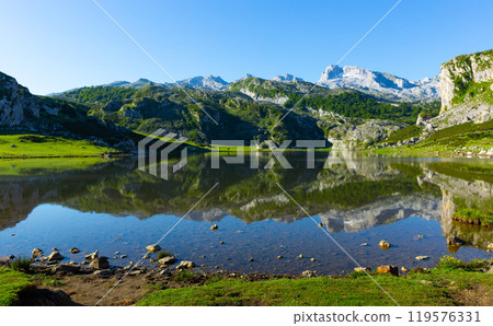 Covadonga mountain landscape reflecting in lake 119576331