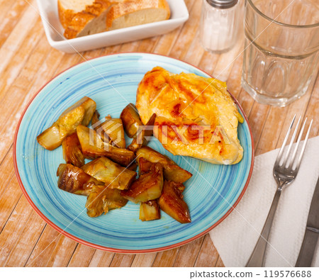 Grilled chicken breast with artichokes, healthy dinner Grilled chicken breast with artichokes, healthy dinner 119576688