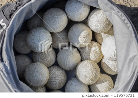 A ball case full of J-balls (softballs) for youth baseball A ball case full of J-balls (softballs) for youth baseball 119576721