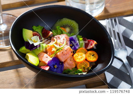Salmon ceviche with avocado, kumquat, figs, kiwi fruit Salmon ceviche with avocado, kumquat, figs, kiwi fruit 119576748