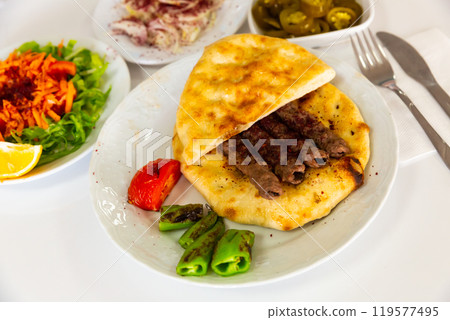 A traditional Turkish dish called Shish Kefte (Isparta sis Kofte). A traditional Turkish dish called Shish Kefte (Isparta sis Kofte). 119577495