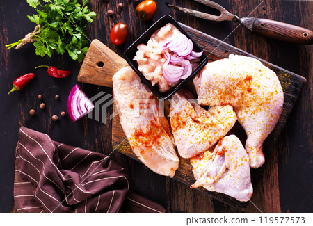 fresh chicken meat on a wooden table fresh chicken meat on a wooden table 119577573