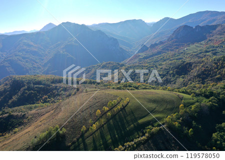 Aerial view of colorful autumn forest covered mountains in the autumn 119578050