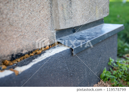 Basement insulation with a tin cover in gray color, renovation works to increase energy efficiency Basement insulation with a tin cover in gray color, renovation works to increase energy efficiency 119578799
